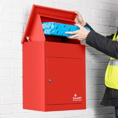 medium red parcel box receiving a delivery