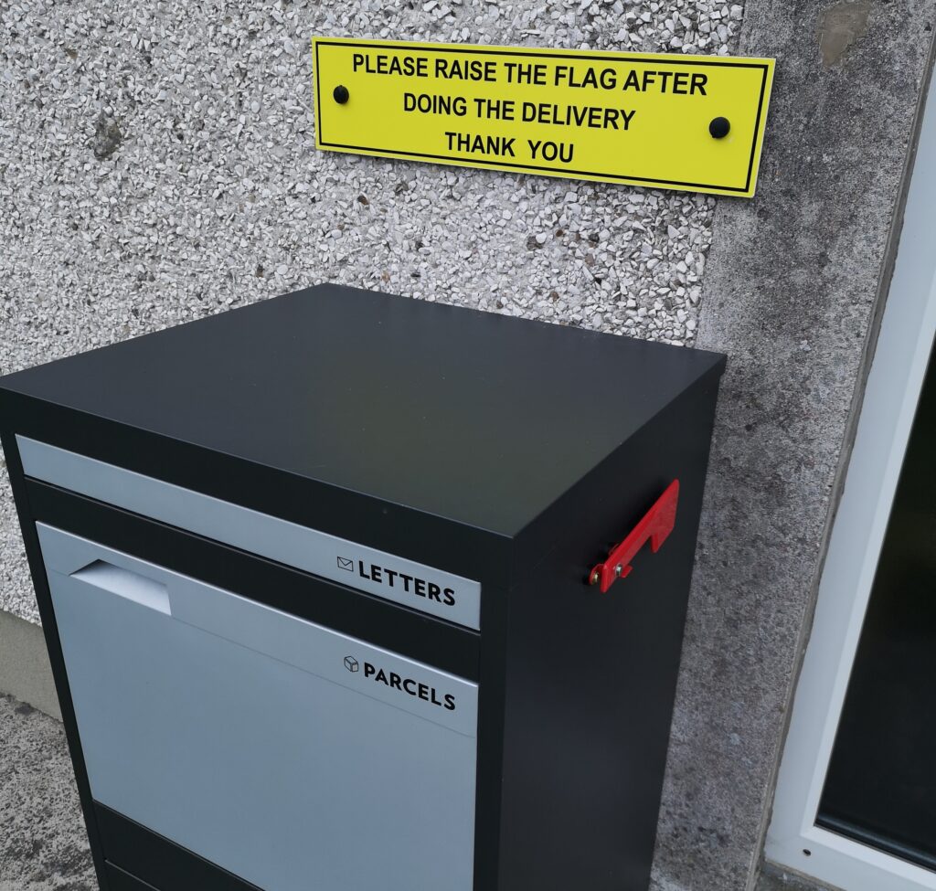 Smart parcel box with sign and American style mailbox flag.